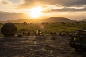 Guests enjoying a sunset safari experience with Asanja Africa in the Tanzania Africa Safari